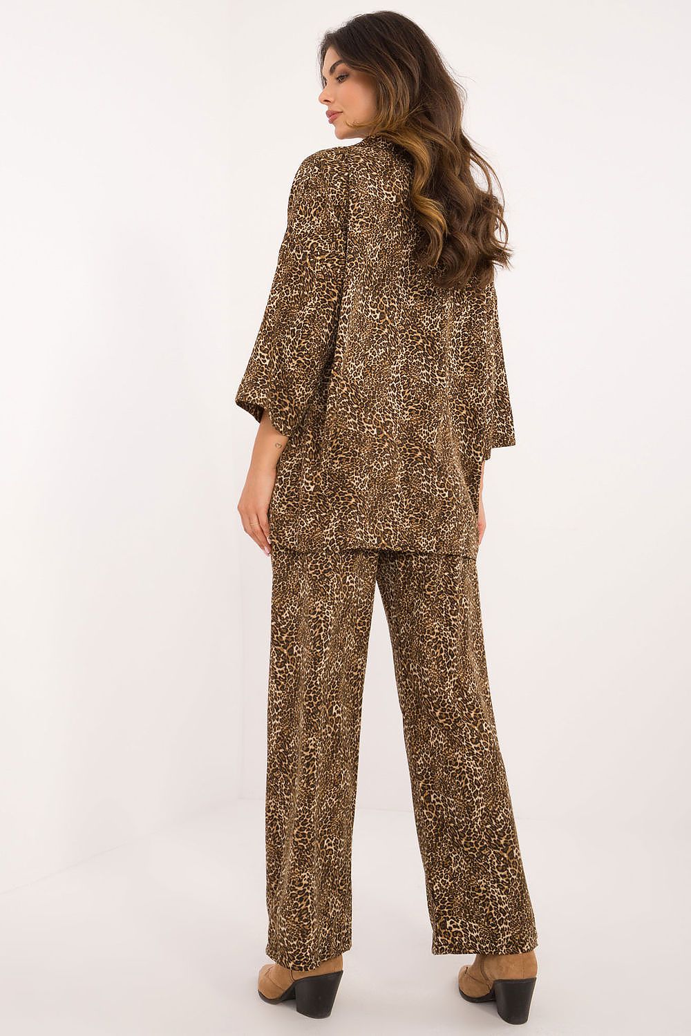 Italy Moda luxury 2-piece casual set featuring a buttoned shirt with 3/4 sleeves and high-waist wide-leg pants, styled in a fashionable animal motif for elegant everyday wear.