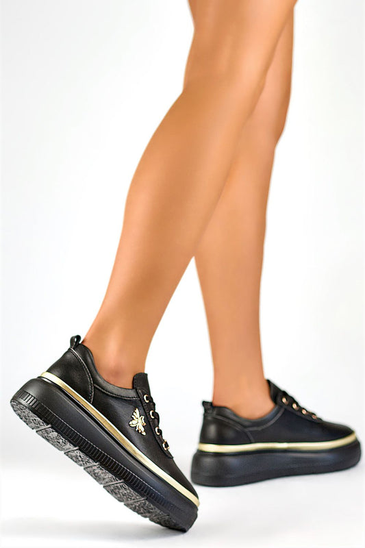 Close-up view of PRIMO black natural leather sport shoes showcasing the superior quality leather and classic lacing for a perfect fit.