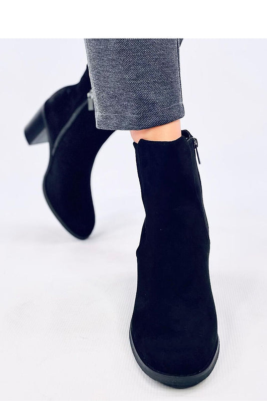 Inello's sophisticated Women's Black Heel Boots with 8cm heels and eco-friendly suede, showcasing a side elastic insert and plush fur lining.