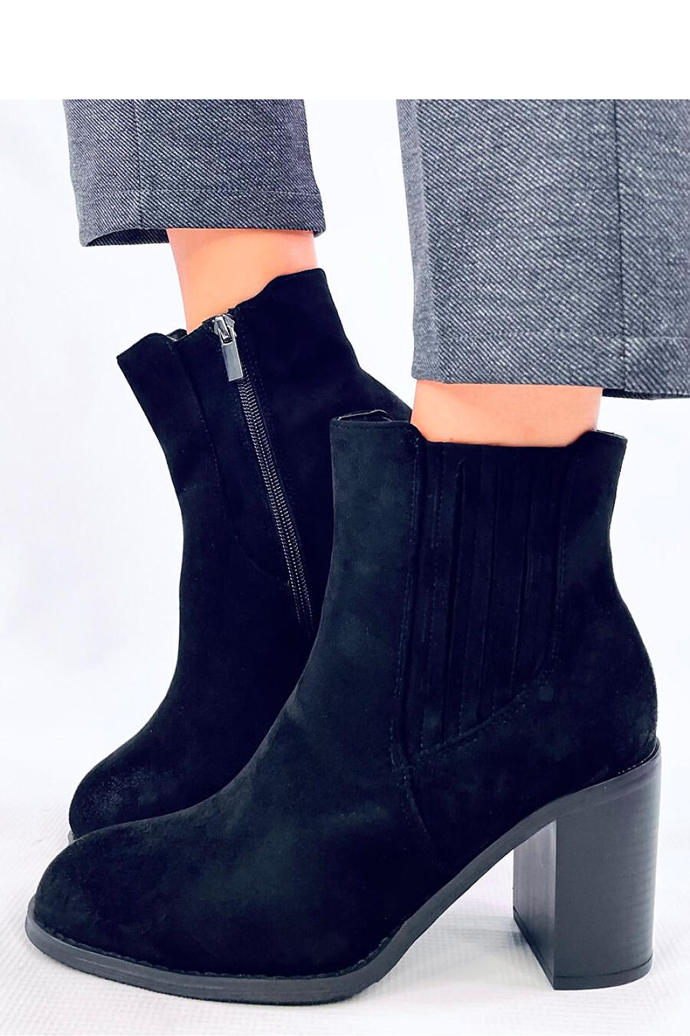Stylish Inello black heel boots with ecological suede, 8cm heel, side elastic insert, and cozy soft fur lining, ideal for chic outfits.