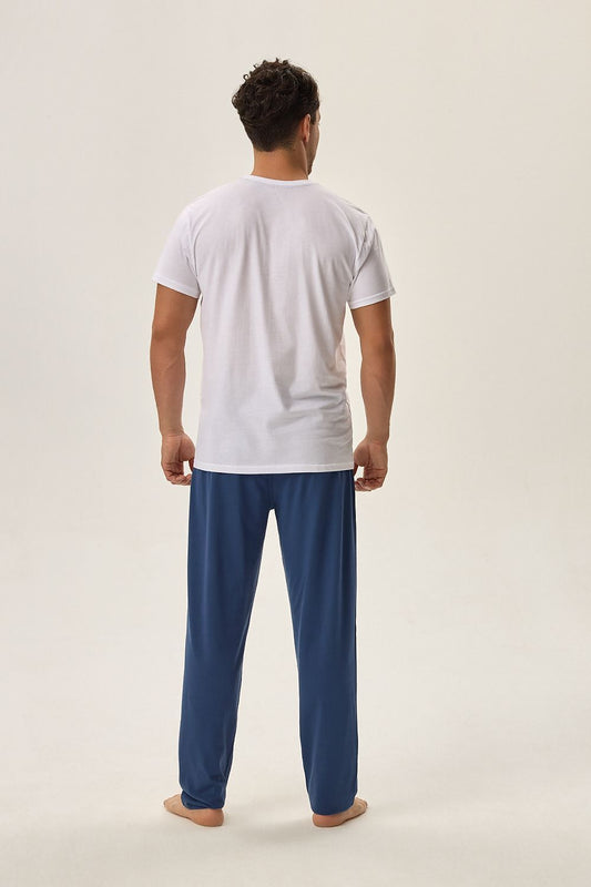 Close-up of Henderson Cotton Pyjama Set showcasing the soft cotton texture and chic design of the white tee and blue trousers, ideal for stylish lounging.