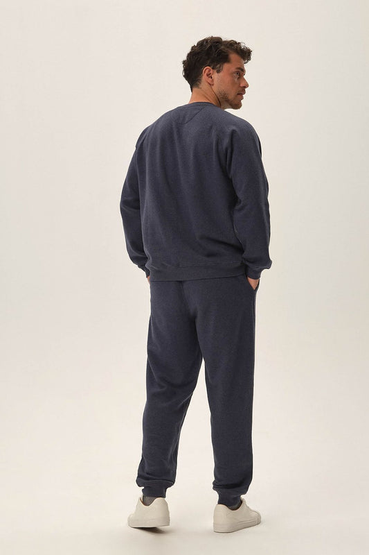 Detailed view of the Henderson navy blue tracksuit set, showcasing the soft fabric and elegant design suitable for casual luxury.