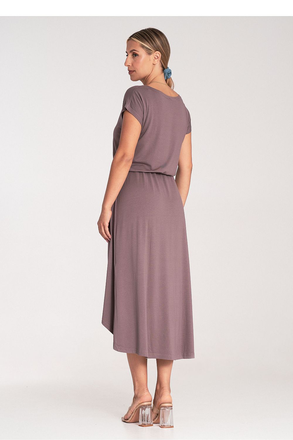 Detail shot of the Figl waist tie on the asymmetrical day dress, highlighting the chic and sophisticated design.