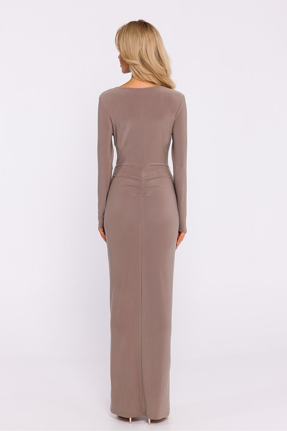 Back view of the Moe elegant long dress showcasing long sleeves, modeling pleats, and high slit, perfect for a sophisticated silhouette.