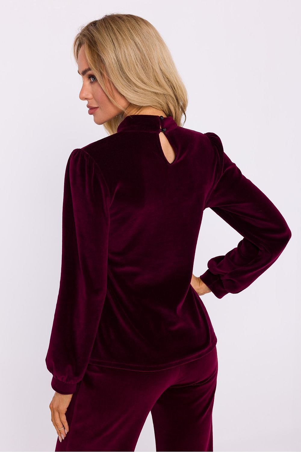 Luxury elegant velour knit blouse by Moe featuring a halter neckline and stylish button detail, perfect for chic evening outings.