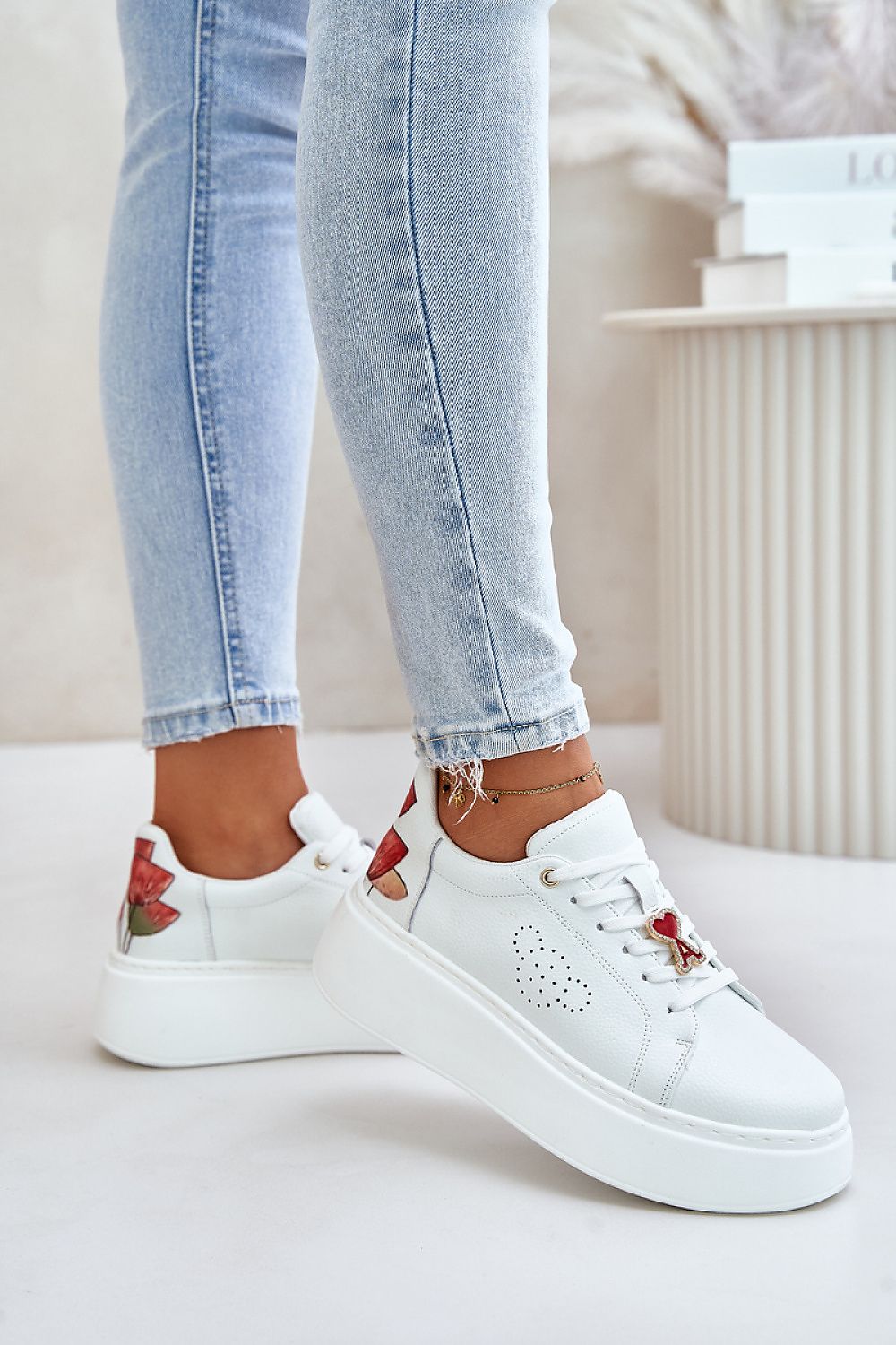 Sophisticated women's natural leather sneakers by Step in Style, designed for comfort with a modern platform and unique tulip details.