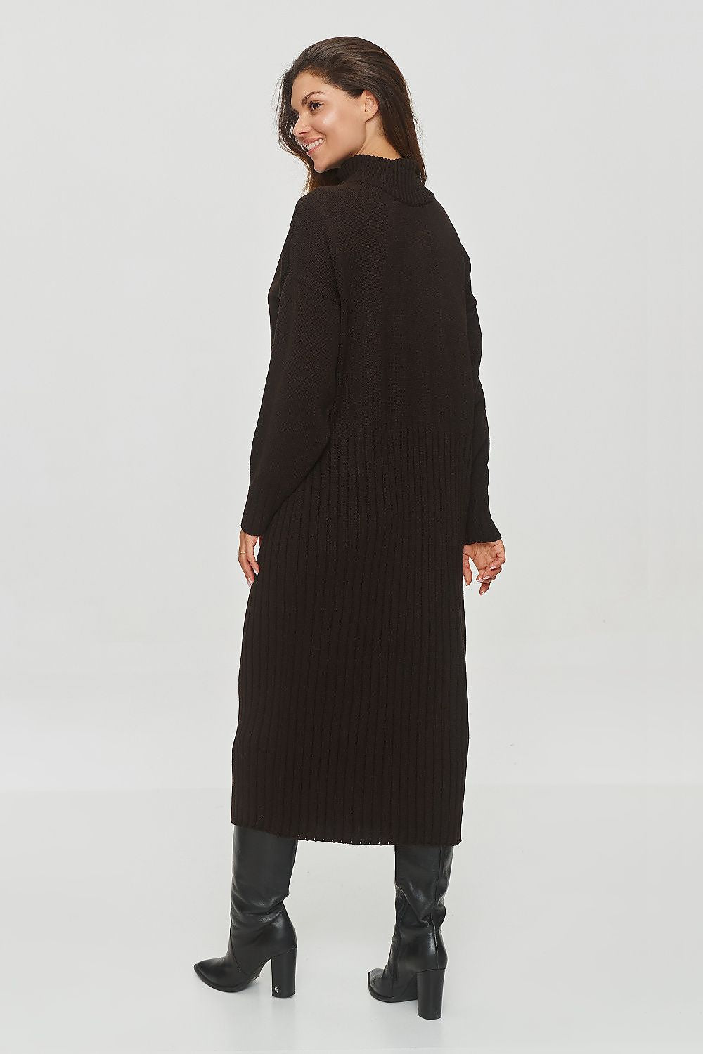 Luxury knitted Daydress by Makadamia featuring a sophisticated ribbed pattern texture, elegant turtleneck collar, and stylish long sleeves, perfect for versatile wear across casual and formal occasions.