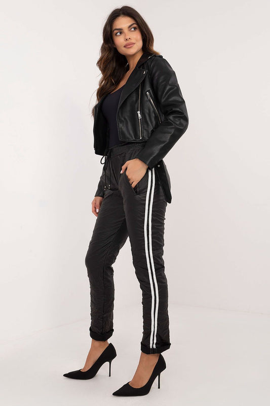 Luxurious eco-leather pants for women by Italy Moda, featuring a high waist and modern tapered legs for an elegant silhouette.