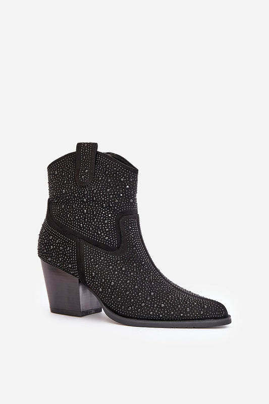 Close-up view of exquisite embellishments on luxury suede cowboy boots, showcasing distinct design features, by Step in Style.