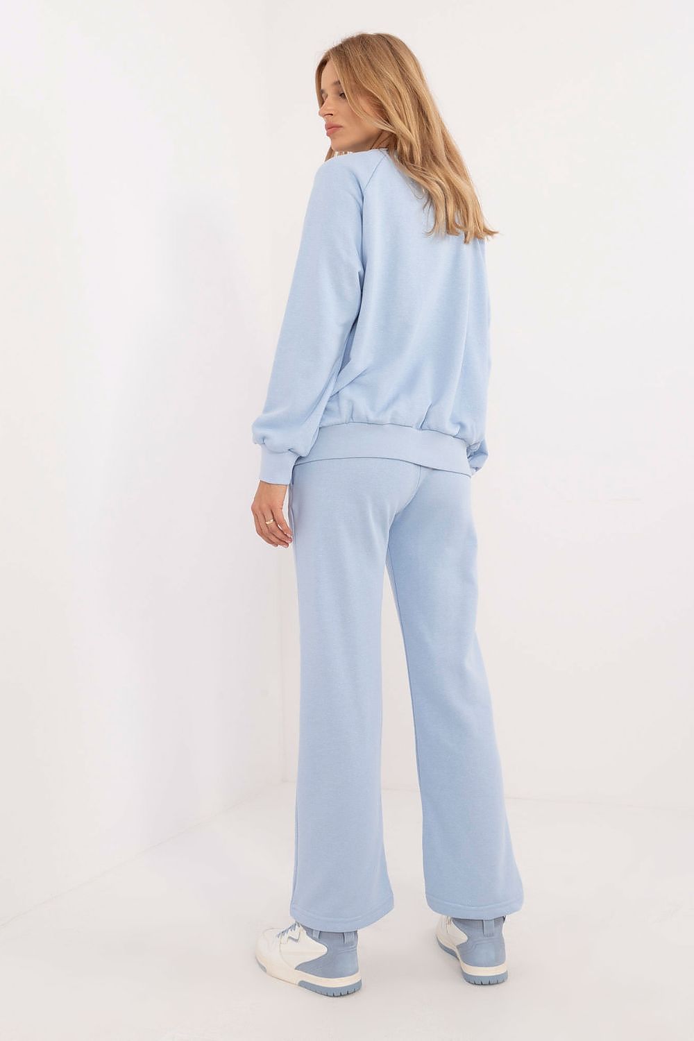 Detail shot of the high waist pants from the Luxury Women's Casual Tracksuit Set, showcasing the drawstring waistband and practical side pockets, designed by Factory Price.