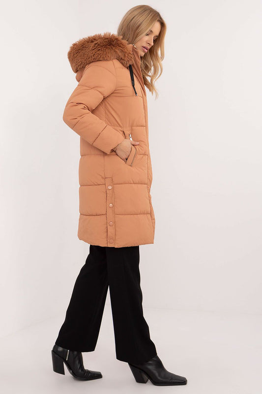 Elegant quilted winter jacket with an extended cut and practical pockets by Factory Price, designed for warmth and comfort during cold seasons.