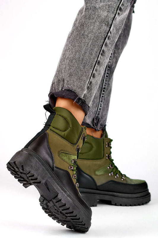 Stylish PRIMO Women's black and green trappers with durable synthetic materials, perfect for cold weather, showcasing a classic round toe and lace-up front.