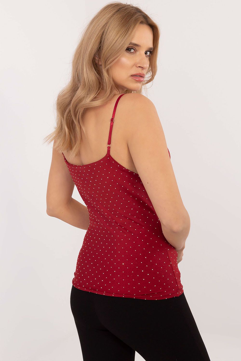 Flat lay shot of the Italy Moda elegant top, beautifully displaying the combination of polyester and viscose.