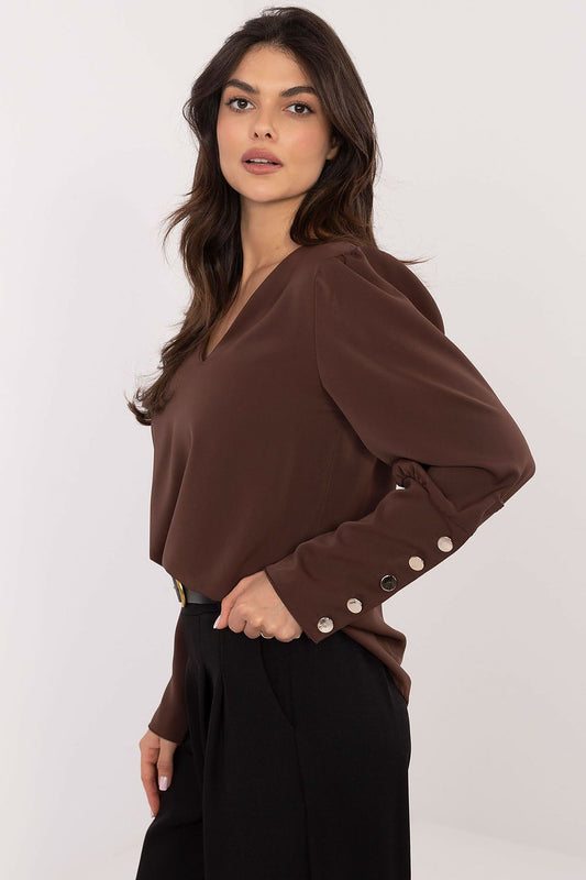 Close-up of Italy Moda's Elegant V-Neck Blouse featuring intricate puffy sleeves and refined design for sophisticated style.