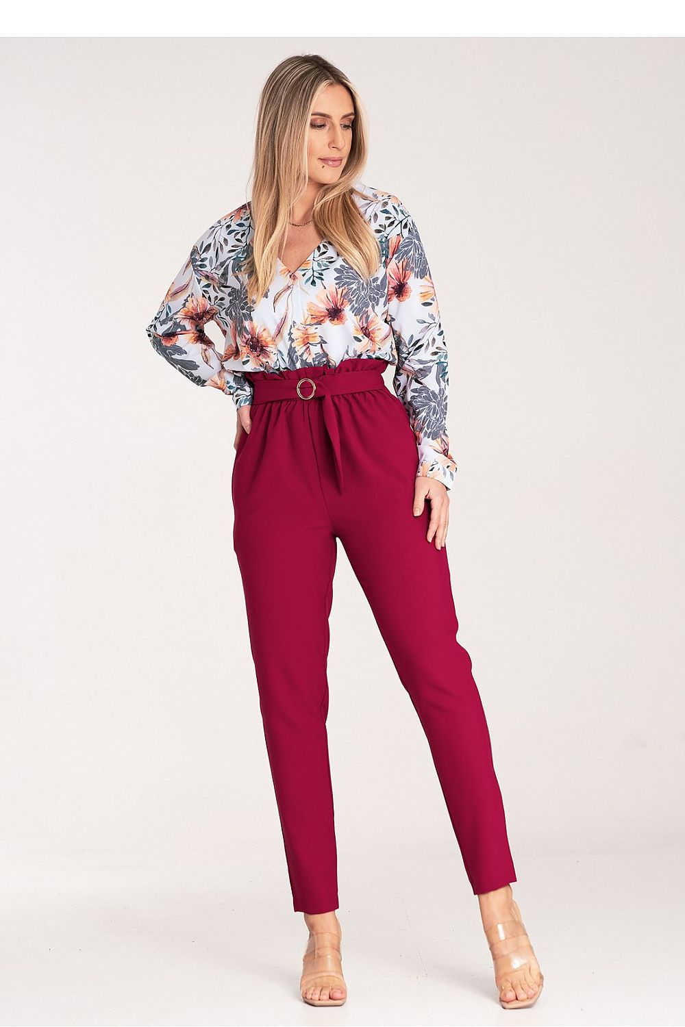 Elegant women's Figl trousers featuring a gold buckle, designed with tapered, pleated details and side seam pockets, suitable for casual and formal wear.