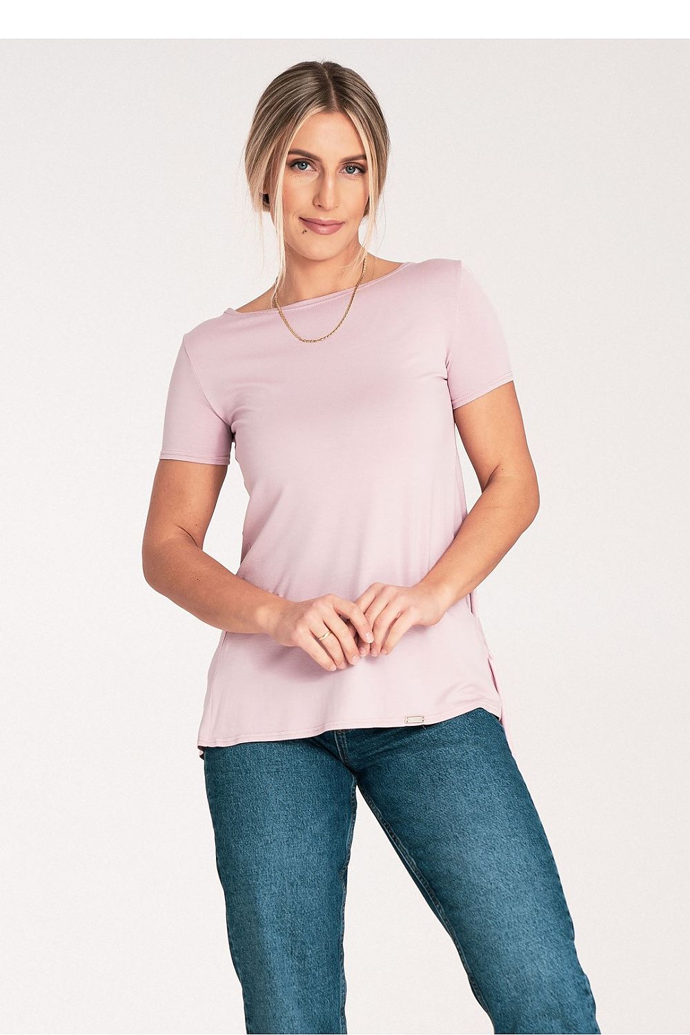 Elegant Figl blouse with long sleeves and a stylish round neckline, showcasing a frill cutout on the back.