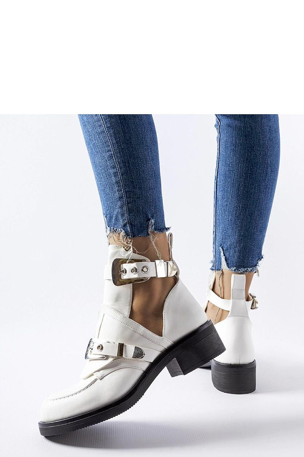 Luxurious Solea Pink Sperone cutout boots with a modern buckle, designed for comfort and style, suitable for colder days and crafted for sustainability.