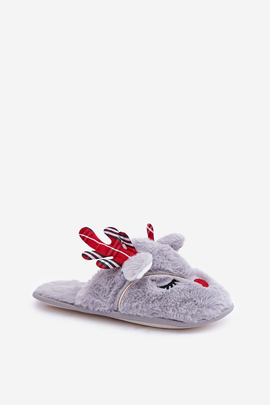 Luxury holiday slippers from Step in Style featuring a reindeer fur motif, ideal for cozy winter evenings.