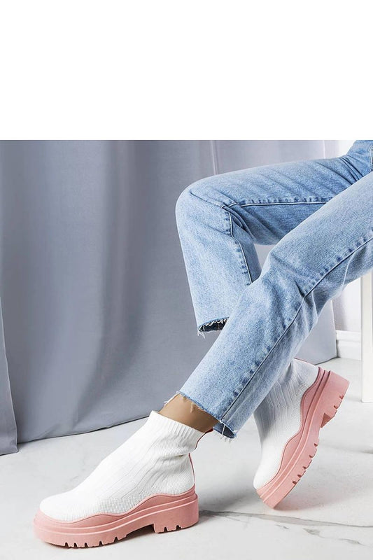 Chic Solea White Sock Boots with Pink Sole, showcasing a unique character with a calf-high shaft and colourful thick sole.