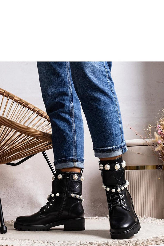 Close-up of Carvala's Luxury Black Lace-Up Women's Ankle Boots, featuring sophisticated pearl straps and high-quality materials for premium comfort.