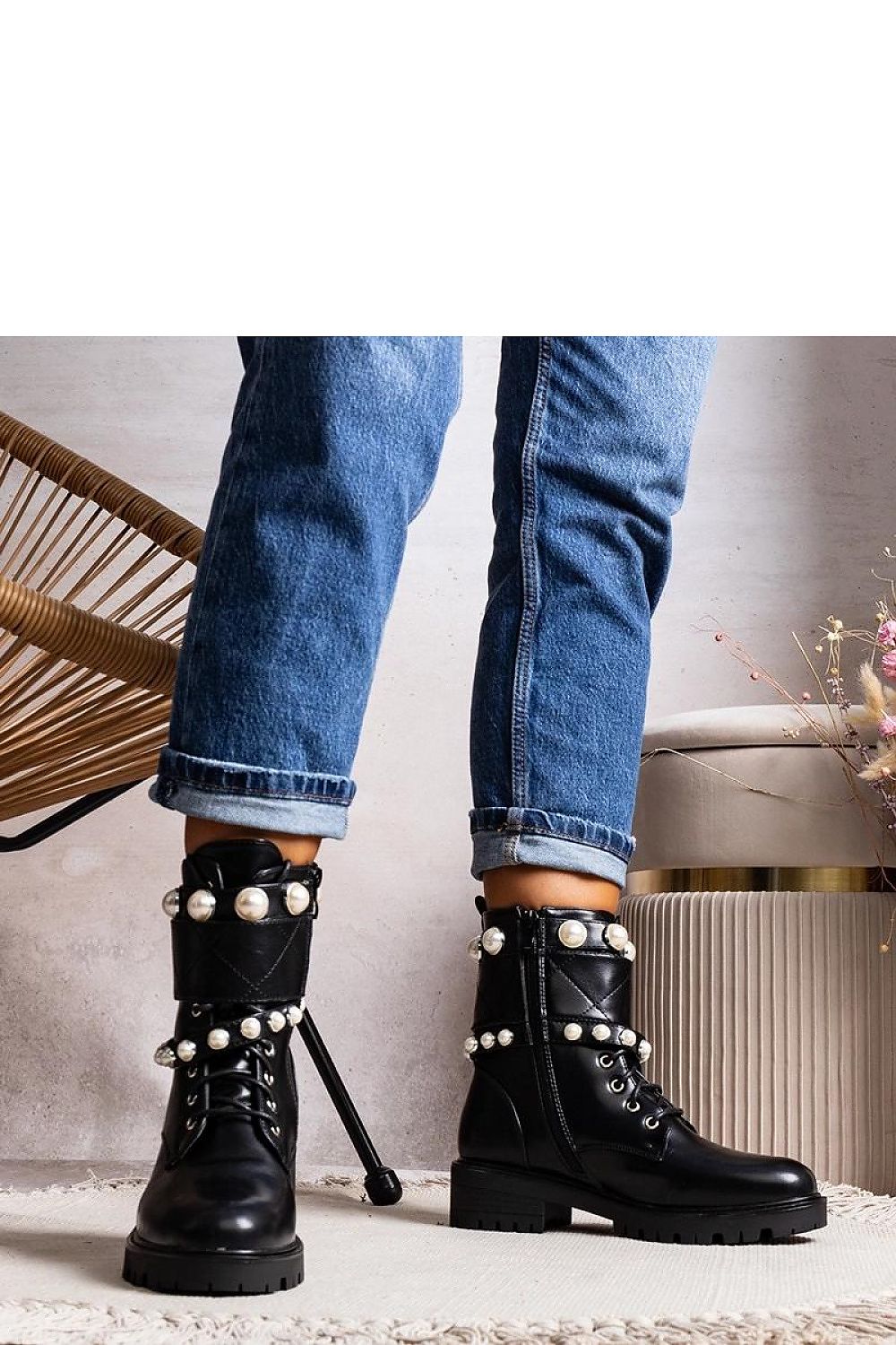 Stylish display of Carvala Luxury Black Lace-Up Women's Ankle Boots with Pearl Straps, ideal for adding a touch of elegance to your fall-winter wardrobe.