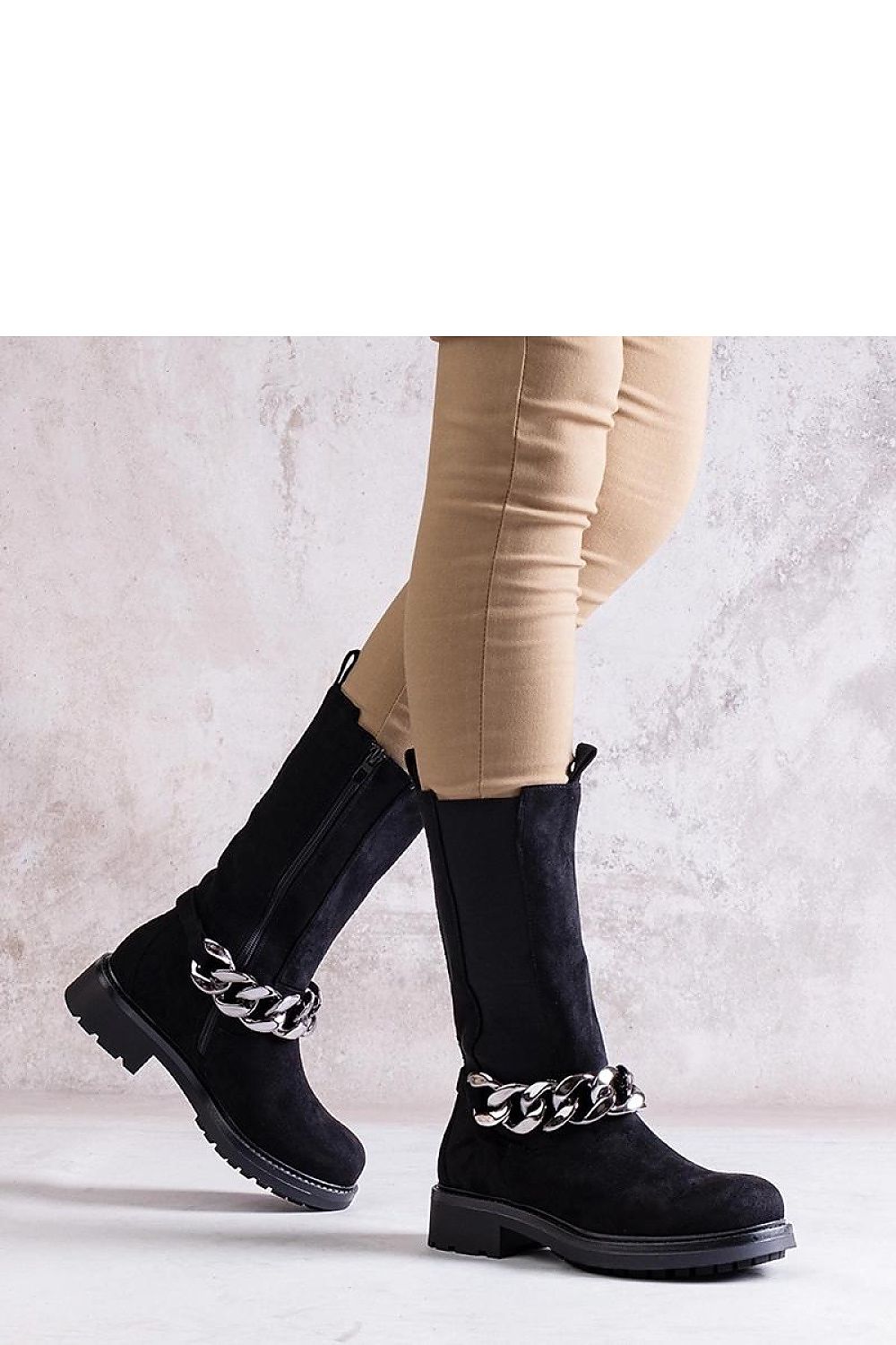 Sophisticated black ankle boots for women by Solea, crafted from eco leather with a contemporary chain detail, offering both style and comfort for winter outfits.