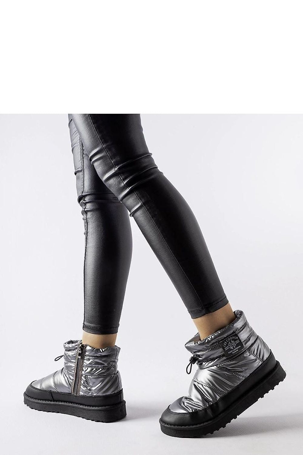 Lifestyle shot of Lee Cooper LCJ-23-44-1966L Gray Insulated Snow Boots being worn, showcasing their versatility and stylish appeal for cold weather occasions.