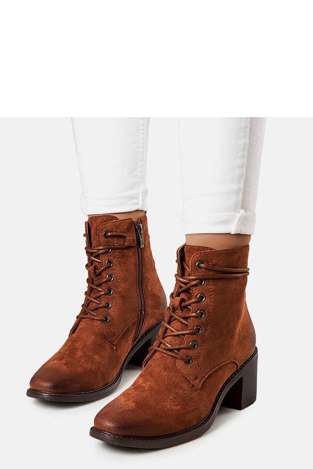 Solea Sanlow ankle boots in a chic autumn setting, illustrating their ideal pairing with seasonal outfits for effortless elegance.