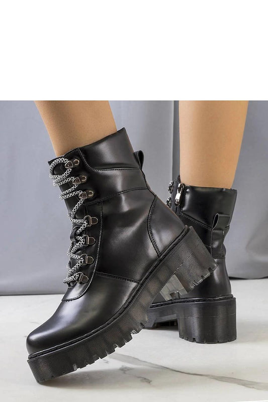 Close-up view of Solea Hildel Ankle Boots showcasing decorative lacing and high-quality materials, perfect for adding elegance to your seasonal wardrobe.