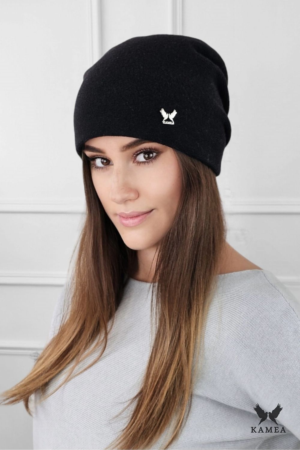 Close-up of Kamea LILY woolen women's hat in navy blue, showcasing the luxurious fabric and distinct logo detail.