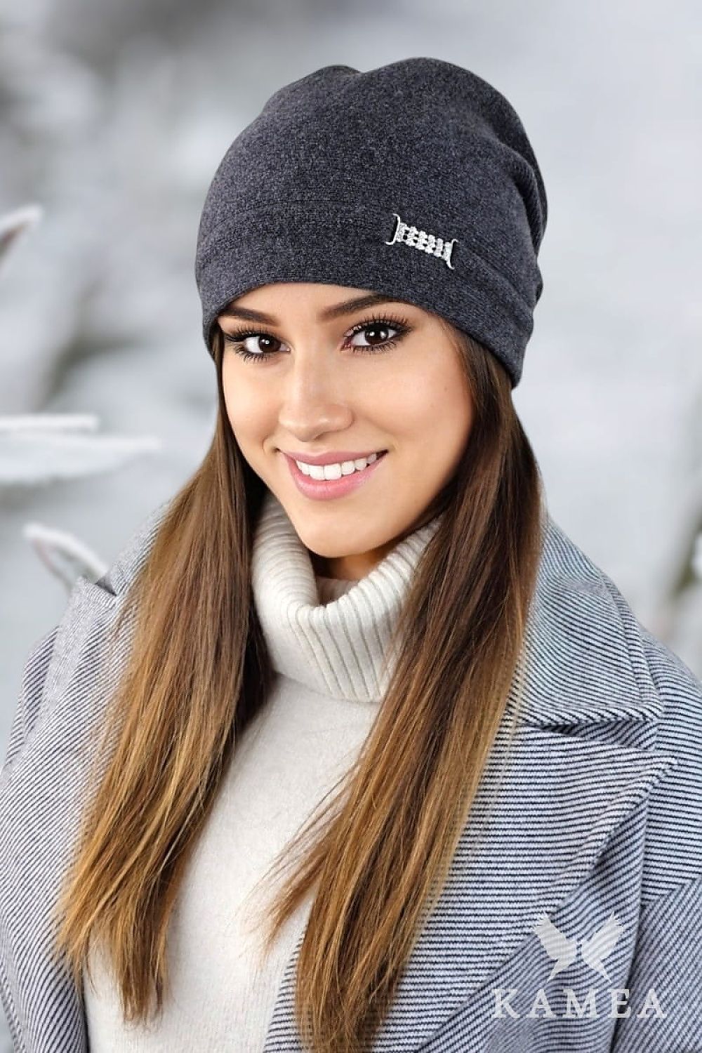 A model wearing Kamea Luxury Women's Woolen Hat in Ash Rose, highlighting the comfort and warmth of high-quality wool.