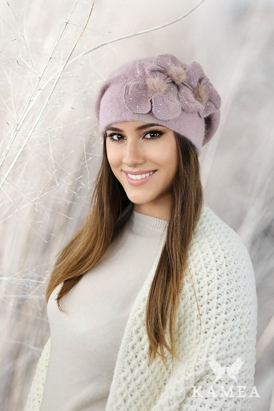 Chic gray CINDY angora beret from Kamea adorned with delicate fur pompons and intricate flower details, an exquisite accessory for stylish outfits.