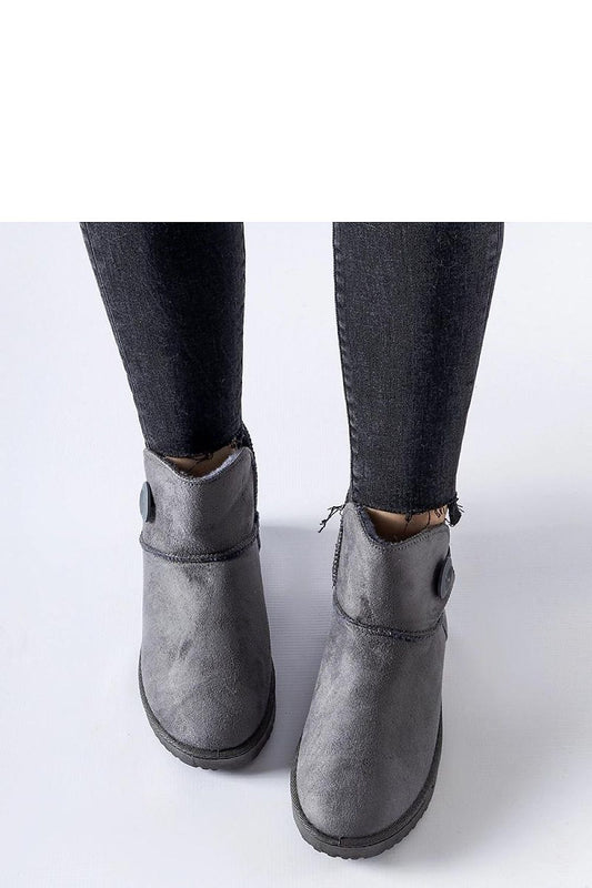 Close-up view of Solea insulated snow boots in grey featuring a comfortable round toe and a durable rubber outer, perfect for winter wear.