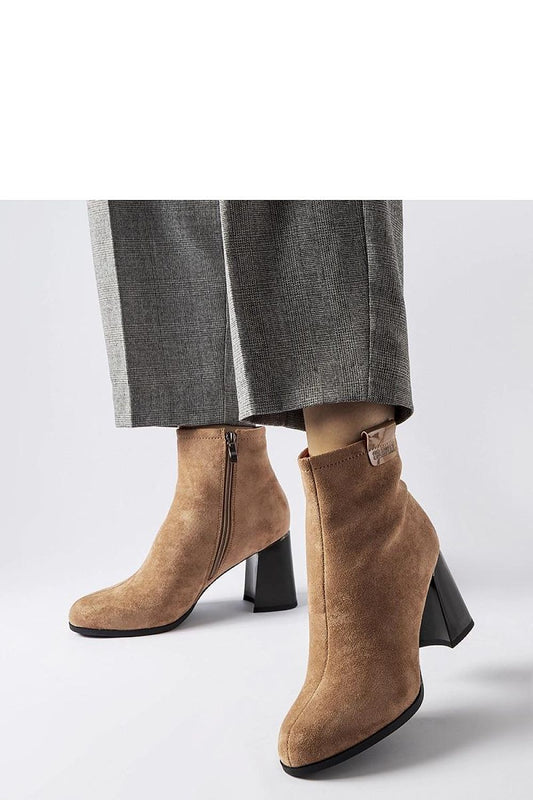 Elegant Serbadone beige stiletto heel boots, crafted from eco leather with a 7.5 cm heel height, ideal for winter wear with insulation and a slender ankle design.