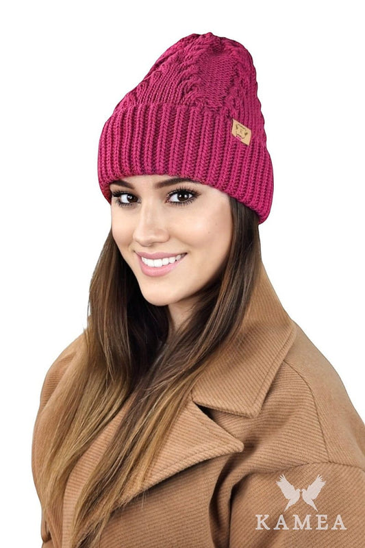 Premium Kamea winter hat STELLA in mustard, showcasing its soft texture and unique patterns, ideal for warmth and comfort during colder days.