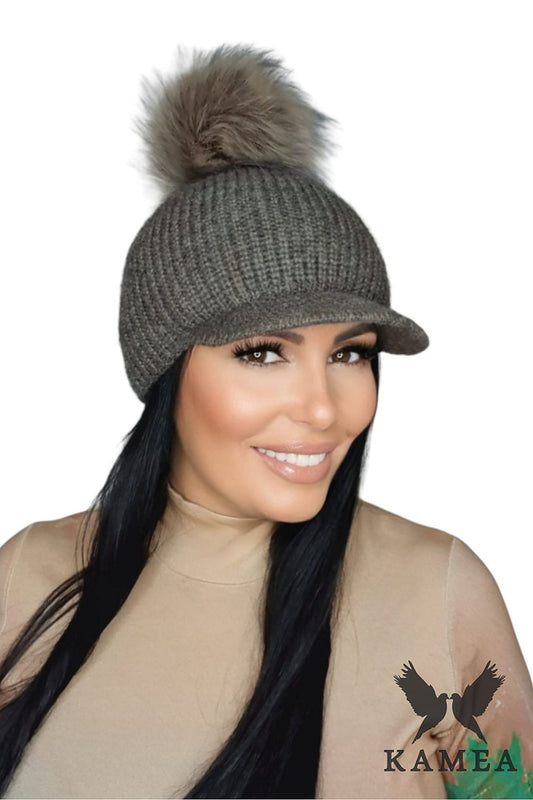 Premium quality burgundy Kamea winter hat with a stylish visor and natural fluffy pompon for added charm.