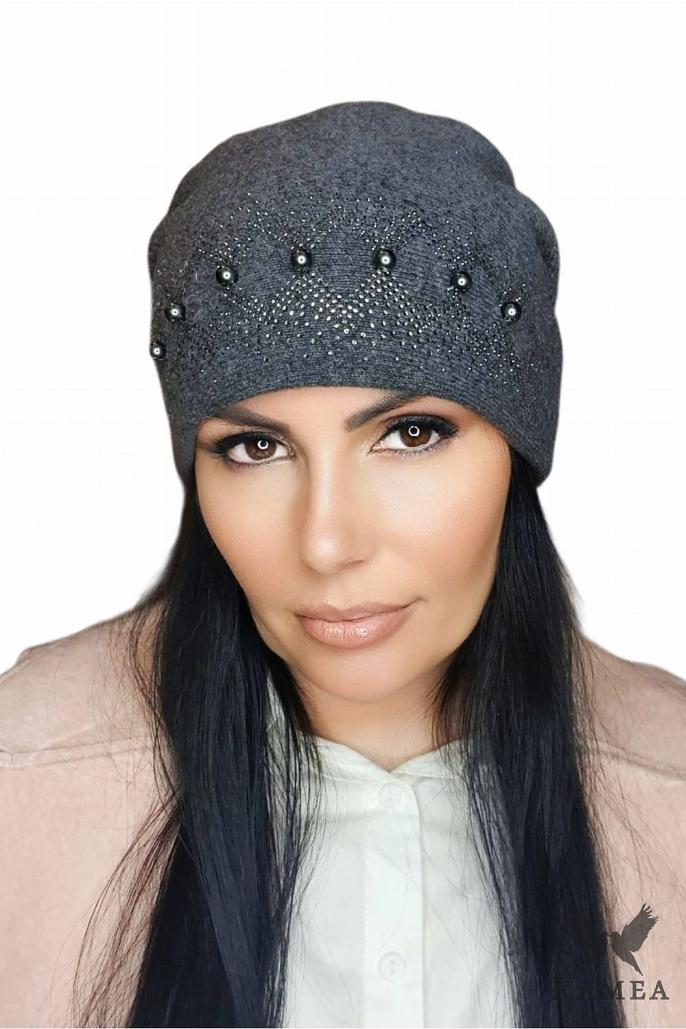 Stylish IMAN women's winter hat in rich purple wool, embellished with shimmering sequins and pearls, crafted by Kamea in Poland for ultimate warmth and elegance.