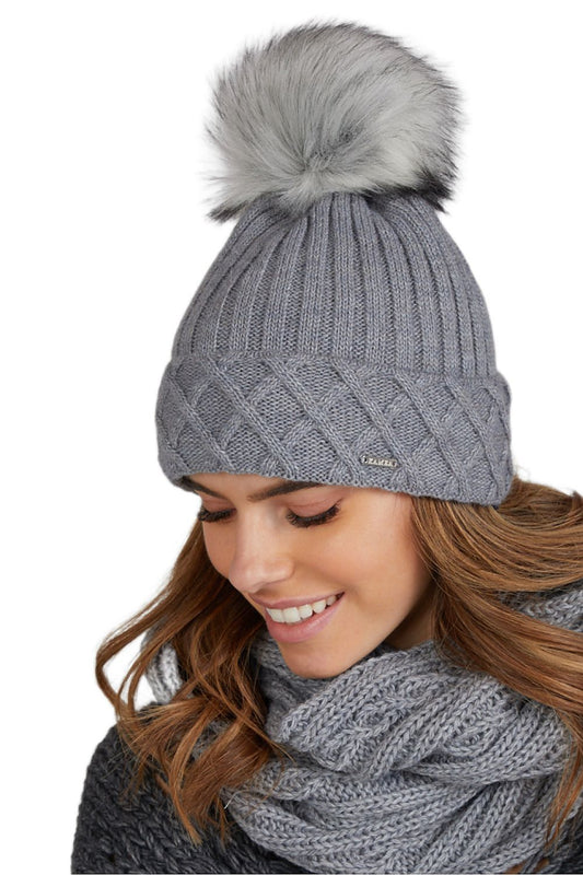 Elegant Kamea women's Messina winter hat with plush pompom, crafted from high-quality wool-acrylic blend, showcasing superior warmth and style for the winter season.