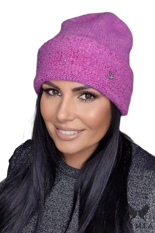 Elegant Kamea Kirke orange hat showcasing luxurious materials and chic design, ideal for adding brightness on cold days.