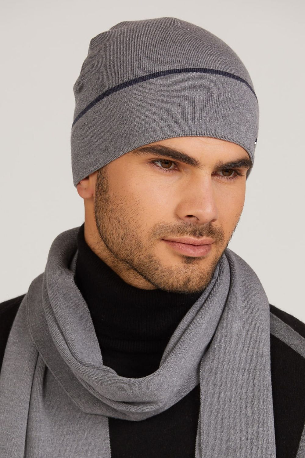 Elegant Kamea Mateo Gray Men's Hat, made of premium silky viscose, showcasing a unique contrasting band for a fashionable and comfortable accessory.