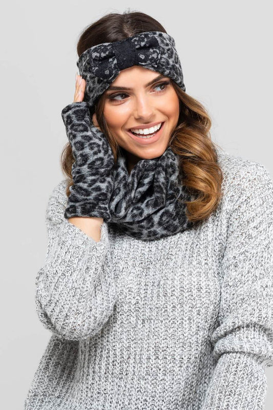Close-up of Kamea's elegant wool blend leopard print headband with a large bow, ideal accessory for sophisticated winter outfits.