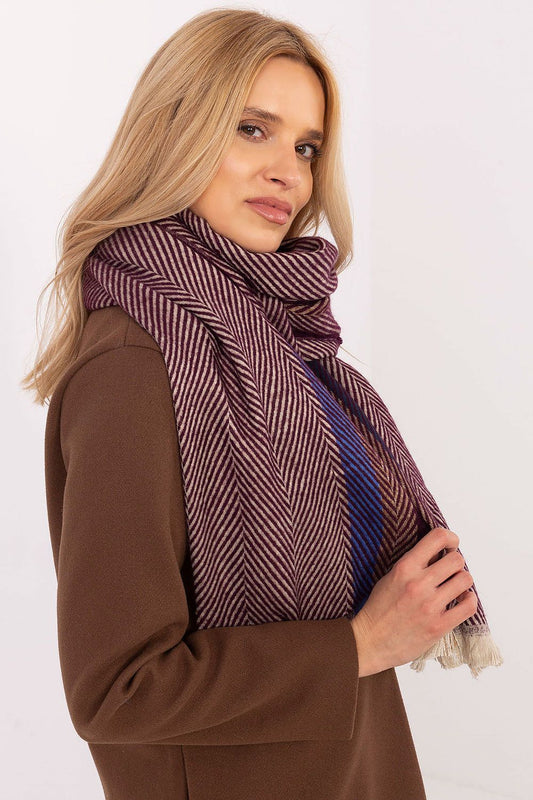 Soft and stylish viscose scarf by AT, featuring fringes and a classic striped pattern for a fashionable winter accessory.