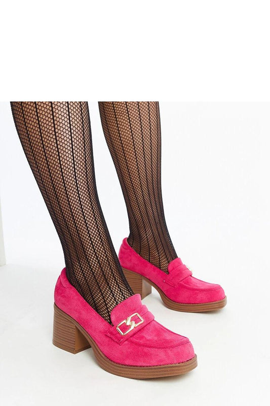 Close-up of the high-quality synthetic leather used in Solea's dark pink Aludra stiletto heels, highlighting the elegant craftsmanship and innovative square toe.