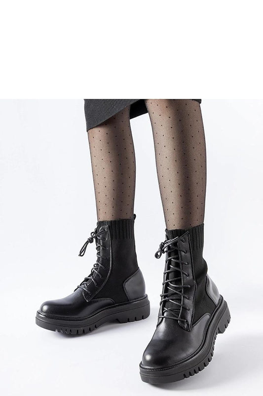 Solea Black Chunky Ankle Boots with a modern fitted cut and durable rubber sole, combining luxury and functionality.