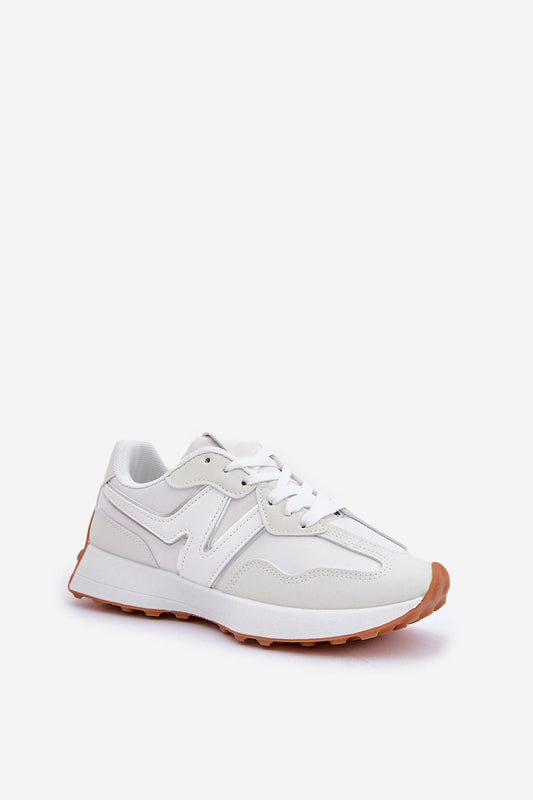 Close-up of Step in Style women's sports shoes featuring a comfort-enhancing removable foam insole and a durable sole for excellent grip.