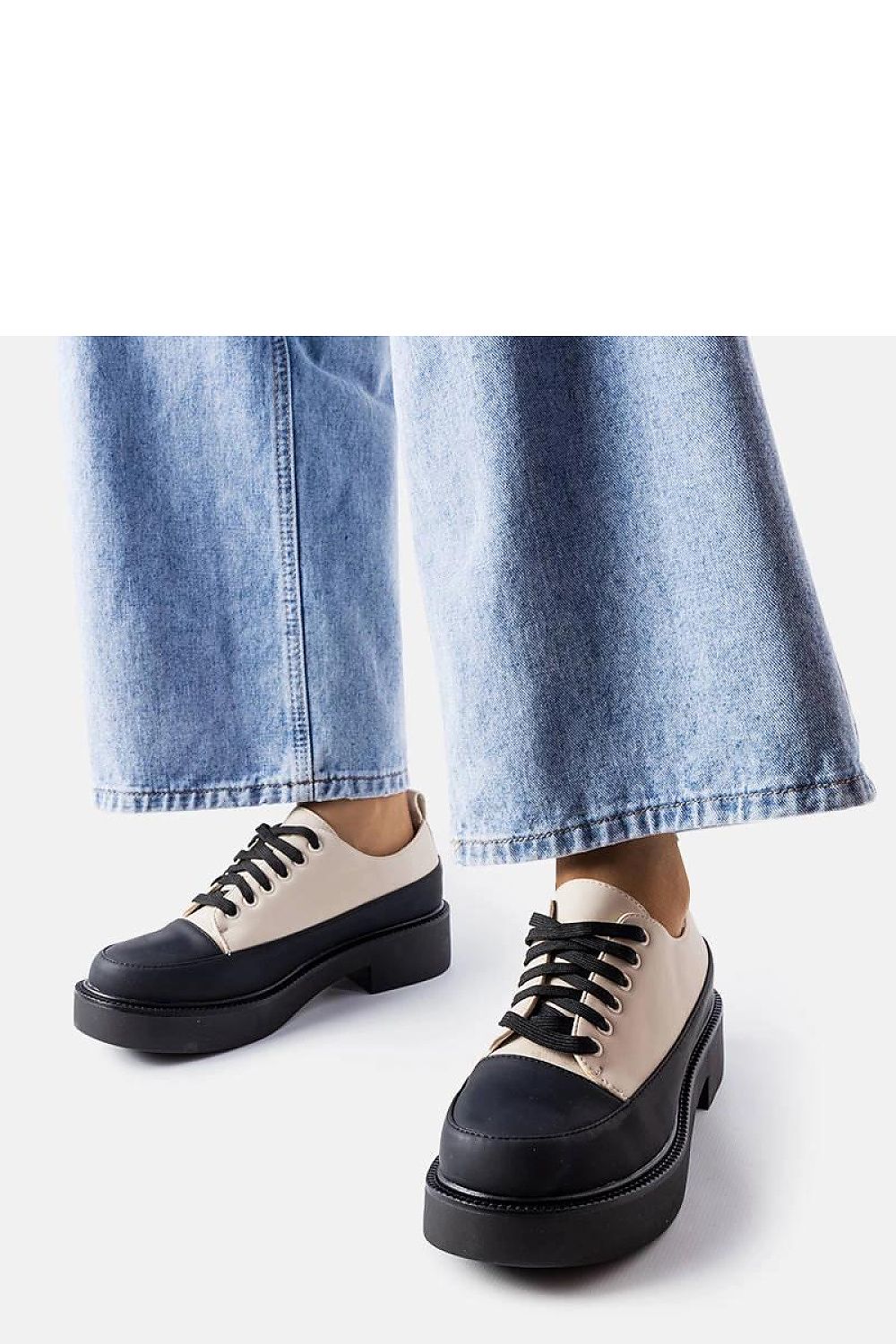 Chic and sophisticated Solea flat-heeled black shoes, featuring eco leather material, perfect for enhancing any summer outfit.