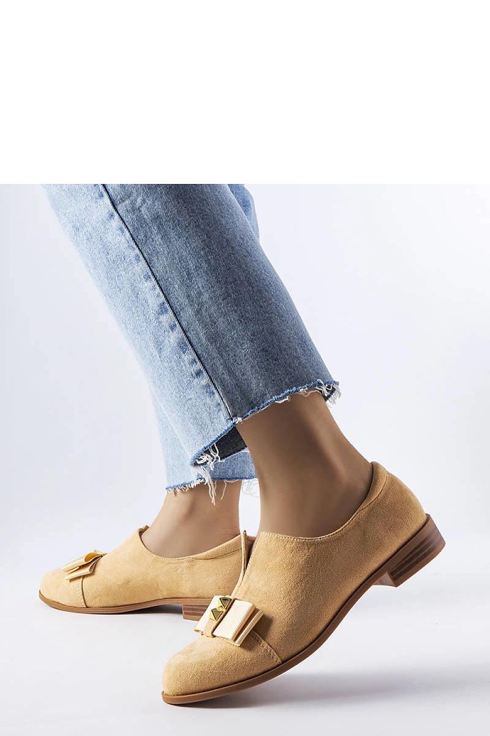 Stylish Solea flat shoes in beige eco-leather with a chic bow, designed to enhance summer outfits, embodying luxury and comfort in every step.