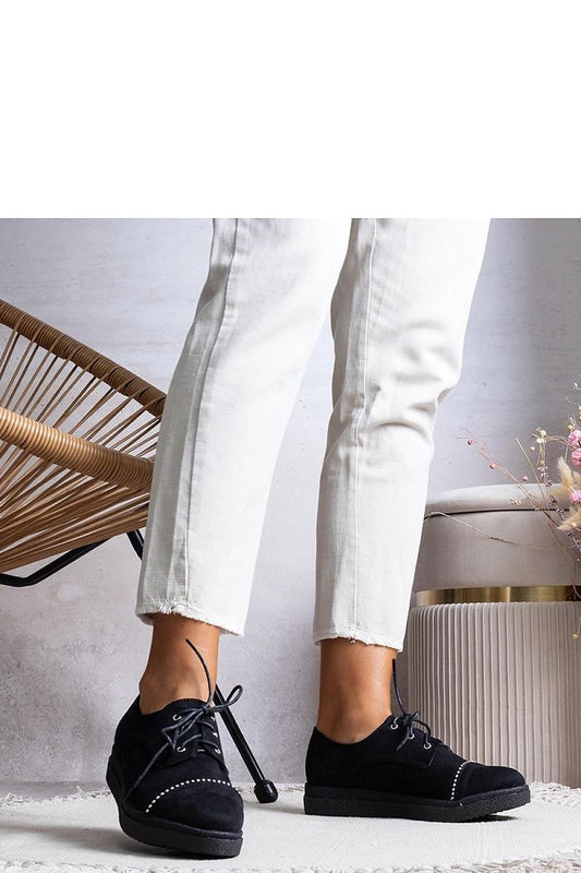 Close-up of Solea Black Women's Vista Shoes showcasing soft eco-suede material and black rubber sole, emphasizing comfort and style for all-day wear.