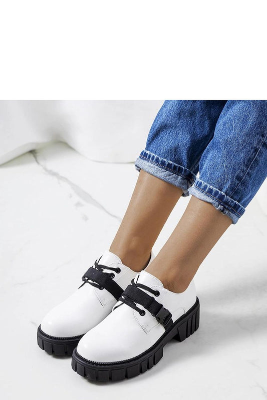 Luxe Solea white half shoes with flexible laces, designed for both casual and formal occasions.