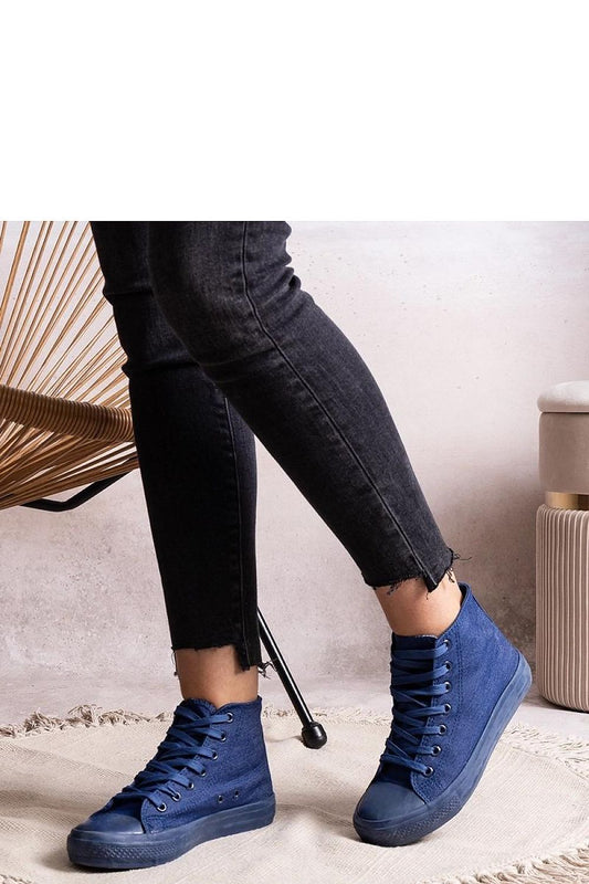 Close-up of Solea blue high denim sneakers, highlighting exquisite craftsmanship and comfortable round toe design for a luxurious look.